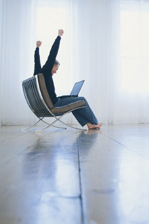 photo: man on computer